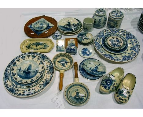 Large quantity Dutch delft blue and white ware to include dishes, wall plates, trinket dishes, tiles, model clogs, lidded vas