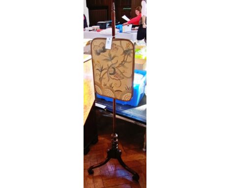 Victorian stained wood and mahogany pole screen having stepped turned finial, the panel with embroidered floral panel, ring t