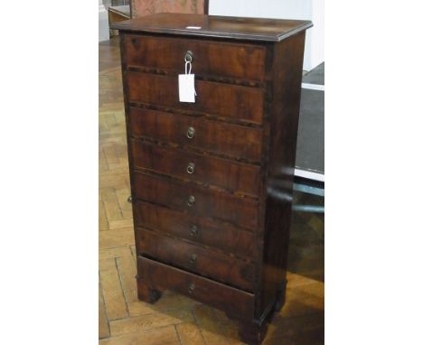 Faux figured wood and walnut narrow chest of eight drawers, having figured top, the drawers all with herringbone crossbanding
