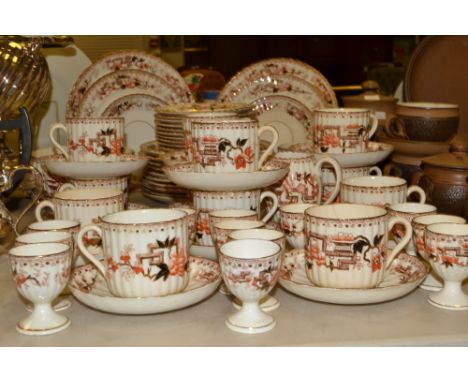 Ceramics - a late 19th century fluted tea service, printed with peonies and fence, c.1890;  twelve egg cups ensuite