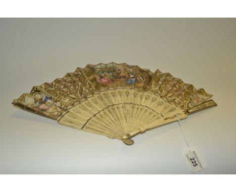 A 19th century French paper and bone twenty two stick fan, painted with young ladies and their suitors playing chess, flanked