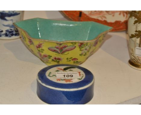 Oriental Ceramics - a Chinese shaped dish, the yellow ground painted with polychrome butterflies, chrysanthemums and peonies,