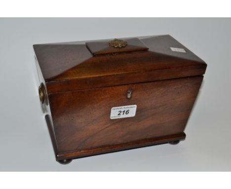 A 19th century mahogany sarcophagus tea caddy, two brass handles, ball feet, c.1870