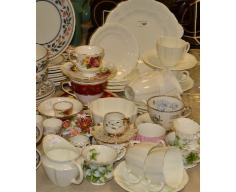 Ceramics - a Royal Crown Derby fluted white tea service, reg number 839892, comprising biscuit plates, seven cups and saucers