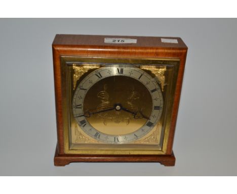 An Elliott walnut mantel clock, retailed by J W Cassidy, Worcester