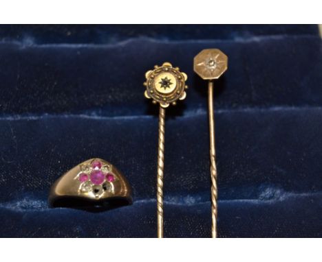 A diamond and ruby cluster ring, gold coloured metal shank;  a 9ct gold and diamond chip stick pin;  etc (3)