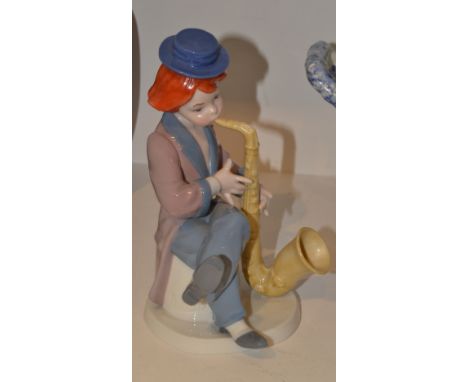 A Goebel figure, The Saxophonist Clown, blue printed marks , impressed mark, A Ruiz