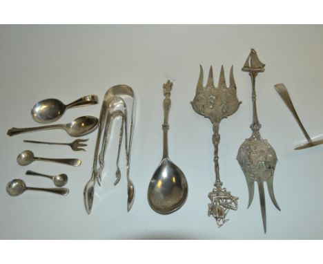 A George William Adams silver apostle spoon, London 1857;  a silver caddy spoon, loop handle, Birmingham 1990;  a pair of sil