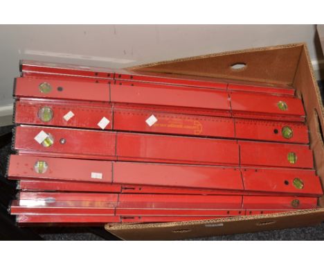 An assortment of corner gauge heavy foldable spirit levels;  a projector screen (2) 