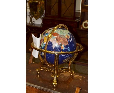 A terrestrial globe, inset with coloured stones