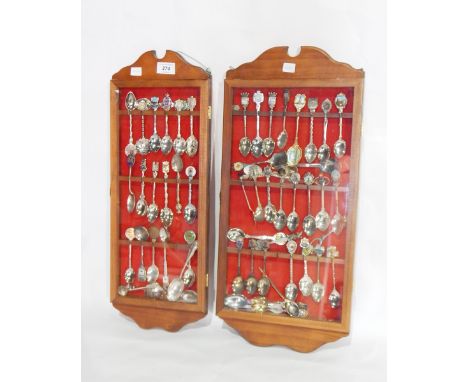 Two glazed cases of souvenir spoons including an enamelled silver example for The Square Compass Lodge Ladies Evening and oth