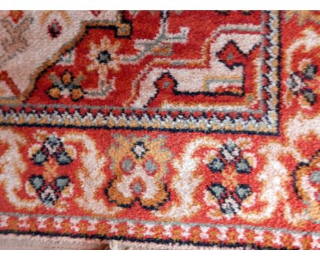 A Persian style carpet with geometric pattern, 160cm x 120cm and another Persian style carpet, 145cm x 95cm 