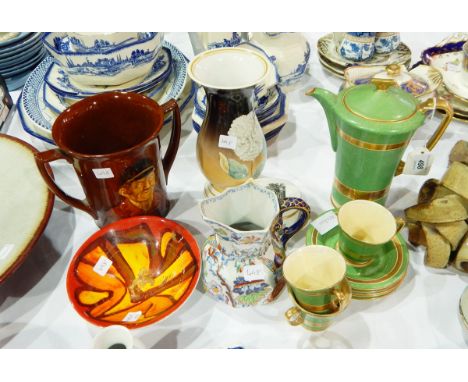 Royal Crown Devon coffee pot with three cups and five saucers 'Modane' gilt bands on a green mottled ground, a Masons ironsto