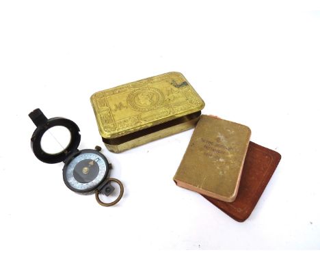 A WWI pocket compass together with a Christmas 1914 Princess Mary gift tin etc
