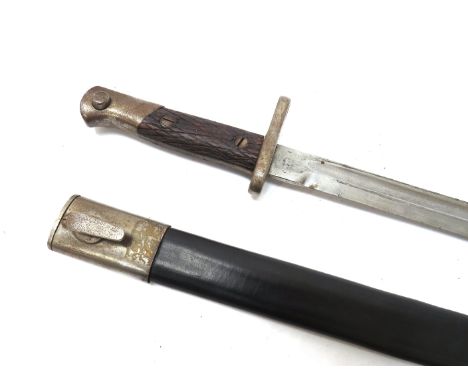 A Spanish model 1913 bayonet, stamped Artilleria Toledo to base, with steel mounted leather scabbard 