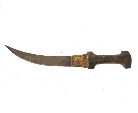 A 19th Century Khanjar dagger possibly Persian, the gilt metal grip with design of animals in foliage with a carved double ed