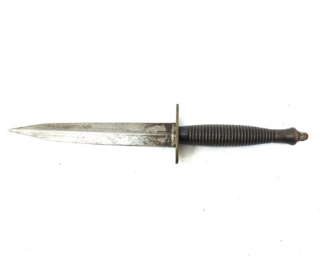 A Fairbairn Sykes (FS) Third Pattern style Commando dagger/knife, brass guard, blade ground towards the point 