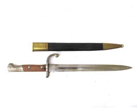 A German-made 1908 pattern bayonet by Weyersberg, Kirschbaum &amp; Co, Solingen, with hooked quillon, brass mounted black lea