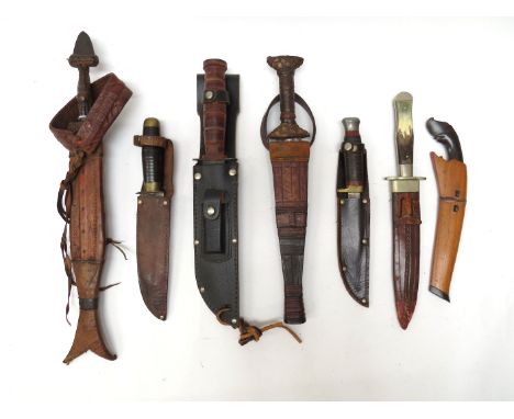 A quantity of vintage knives and edged weapons including relic court sword remnant, Islamic hunting knives and boot knife etc