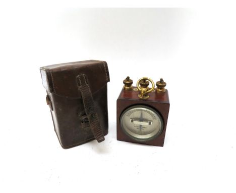 A WWI British Galvanometer by Edison and Swan, the leather case dated 1918