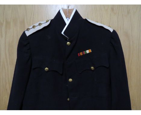 An Indian Army Supply and Transport Corps Dress Tunic belonging to Major Charles Wilfred Hext, complete with Captain rank pip