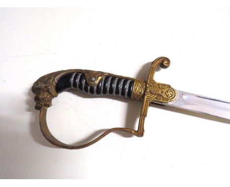 A Third Reich era German army officer's sword, the gilded hilt with eagle and swastika relief, ribbed wired grip joining a sl