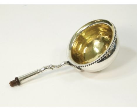 LADLE BOWL. A modern silver punch ladle bowl, with gilt interior. Maker's stamp for Rodney C. Pettit. Approx. 65g. (2 t.oz.)P