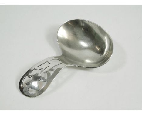 CADDY SPOON. A 1960's silver caddy spoon with pierced thistle handle.Please note that all items in this auction are previousl