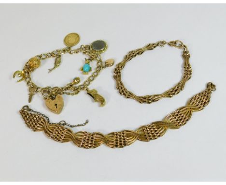 CHARM BRACELET ETC. A vintage gold plated charm bracelet, hung with several charms, including a 9ct. gold key. Also, two gold