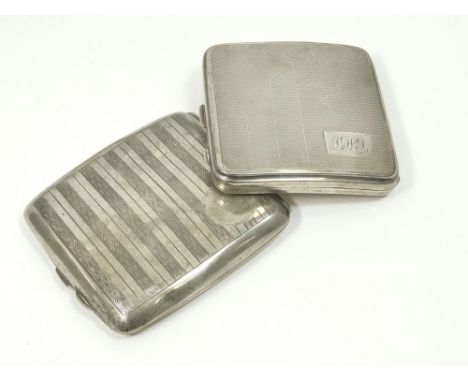 CIGARETTE CASES. An engine turned silver cigarette case. Chester 1924. Also, a presentation engine turned cigarette case, the