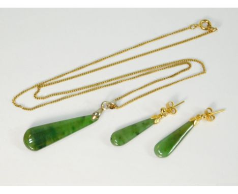 NEPHRITE JADE. A nephrite jade pendant with 18ct. gold plated bale & mount hung on a gilt metal chain. Also, a pair of simila