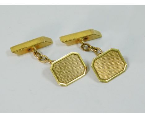 GOLD CUFFLINKS. A pair of 9ct. gold engine turned cufflinks. London 1963. Approx. 4.5g.  Please note that all items in this a