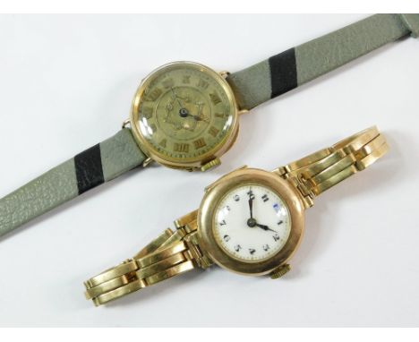 GOLD WATCHES. A lady's early 20th century 9ct. gold cased wristwatch on later expanding 9ct. gold strap. Also, one other earl