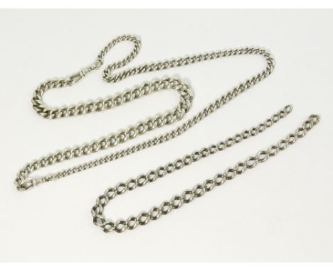 WATCH CHAIN. A graduated curb link watch chain with two clips & two lengths of silver curb link chain. Approx. 80.9g. (2.6 t.