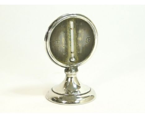 DESK THERMOMETER. A silver mounted desk thermometer (repaired).Please note that all items in this auction are previously owne