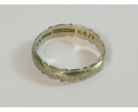 PLATINUM BAND. A shaped platinum band. Size R. Approx. 4.4g.  Please note that all items in this auction are previously owned