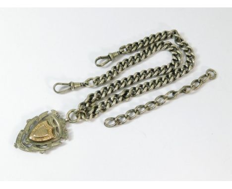 WATCH CHAIN. A silver graduated watch chain with two clips & silver gilt fob attached. Also spare silver links. Gross weight 