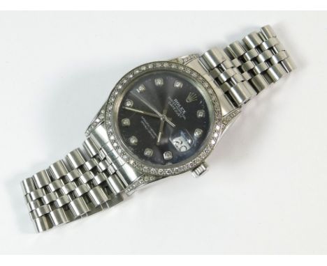 ROLEX. A gentleman's customised Rolex Oyster, Perpetual Datejust, stainless steel wristwatch with Jubilee bracelet. The bezel