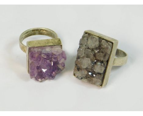 MAGNUS MAXIMUS. Two silver rings by Magnus Maximus Designs of Frizington, Cumbria. One ring set with amethyst quartz, the oth