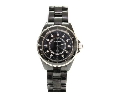 A black ceramic Chanel 'J12' quartz bracelet watch,with a diamond dot dial and 38mm case. The black dial with brilliant cut d