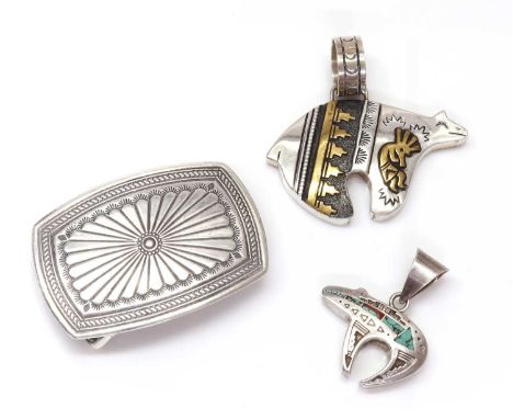 A silver Navajo Spirit bear pendant, by Thomas Singer, with applied bead and overlaid gold snow cloud and Koko Peli decoratio