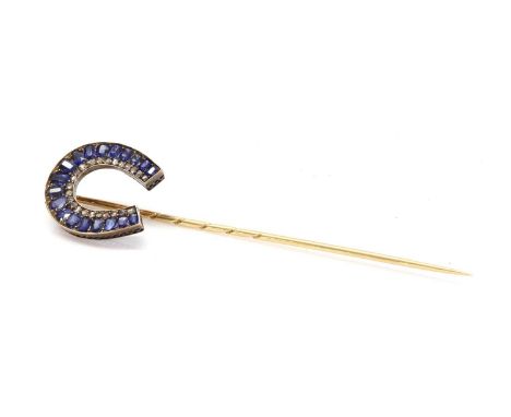 A cased former Austro-Hungarian sapphire and diamond horseshoe stick pin, attributed to Moritz Henolé, c.1900,the horseshoe w