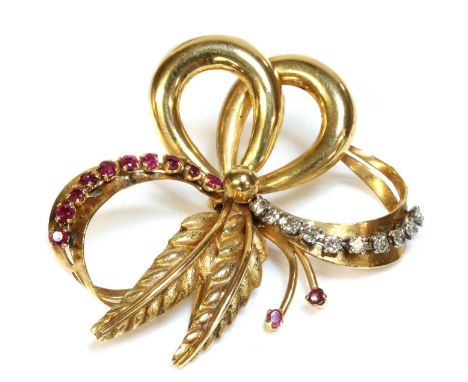 An Italian gold ruby and diamond bow spray brooch, c.1950, with four graduated ribbon loops, and a row of Swiss cut diamonds 