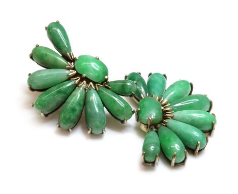 A pair of silver gilt fan shaped jade earrings, c.1935,with an oval cabochon jade, claw set to the centre. A row of radiating