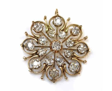 A late Victorian diamond set pendant,with a cushion shaped old Swiss cut diamond, claw set to the centre. Radiating blade edg