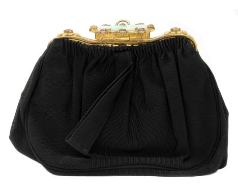 A black grossgrain gem set evening clutch bag, c.1930,by Odette of Alexandria, Egypt. The gathered grossgrain clutch with a m