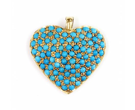 A turquoise set heart shaped pendant/enhancer,with a domed front, pavé set with graduated turquoise cabochons. A hinged bale 