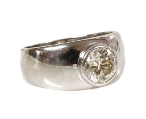 An 18ct white gold single stone diamond ring,with a brilliant cut diamond, estimated as approximately 1.80ct, rub set to a pl