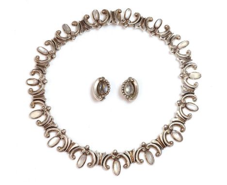 A Taxco sterling silver moonstone necklace and earrings suite, by Antonio Pineda,970, with a series of conjoined 'C' scrolls,