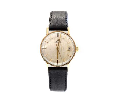 A gentlemen's 9ct gold Omega automatic strap watch, c.1960,model no. 1625002. A 32mm case with a silvered dial, raised black 